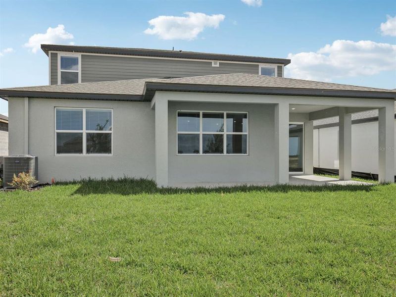 Exterior details and patio area of a home in Coasterra - Reserve Series, Palmetto (Image 28).