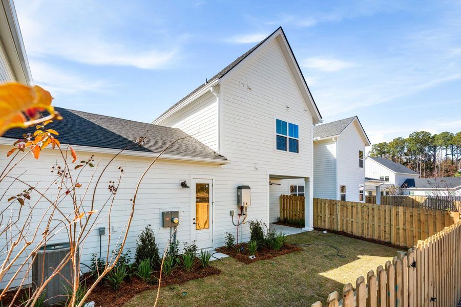 Exterior details and patio area of a home in , Johns Island (Image 31).