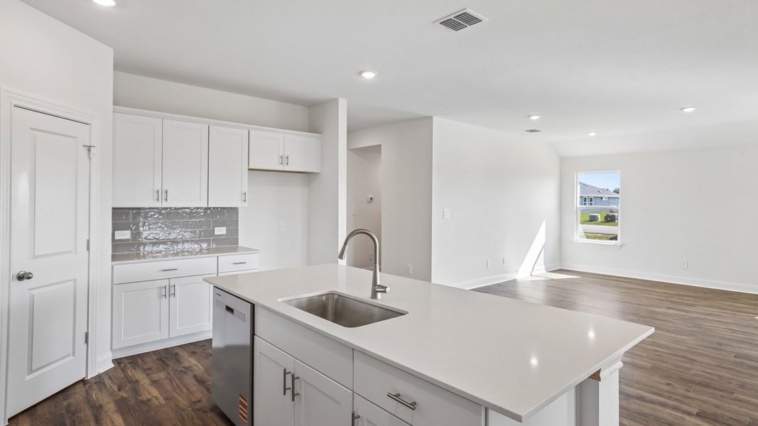 Furnished interior view inside a new home in Railhead, Cedar Creek (Image 7).