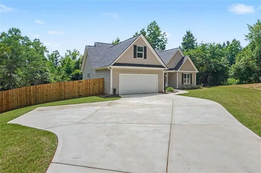 Front exterior of a new home in , Griffin, GA, highlighting curb appeal (Image 23). Front exterior of a new home in , Griffin, GA, highlighting curb appeal (Image 23).