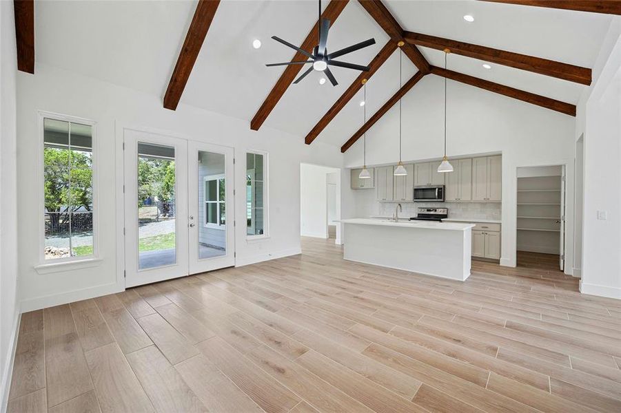 High beamed ceiling. Walk in pantry.