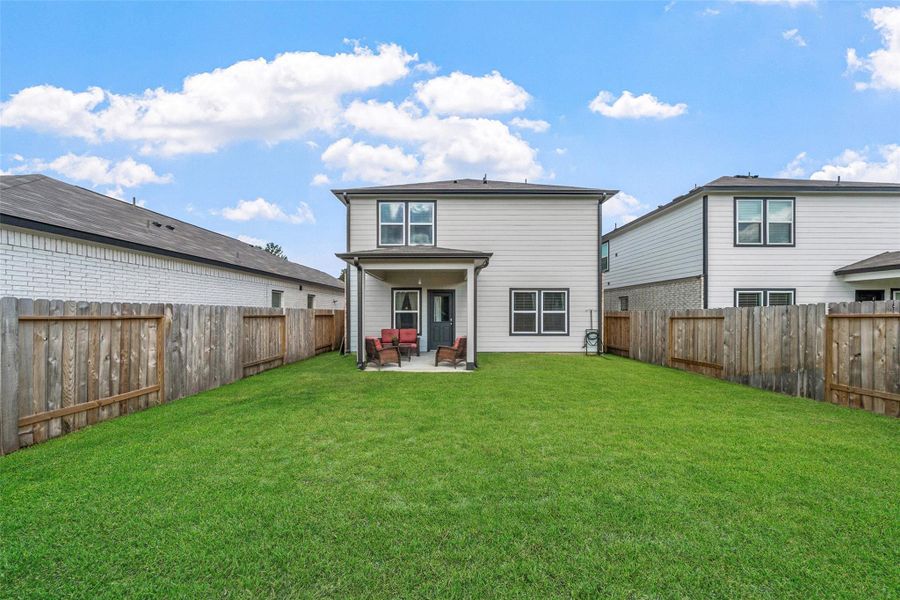Exterior details and patio area of a home in Lakes at Black Oak, Magnolia (Image 2). Exterior details and patio area of a home in Lakes at Black Oak, Magnolia (Image 2).