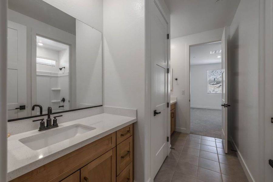 Representative furnished interior of a home built from the Ponderosa by William Ryan Homes in Silver Cross, San Tan Valley (Image 36).