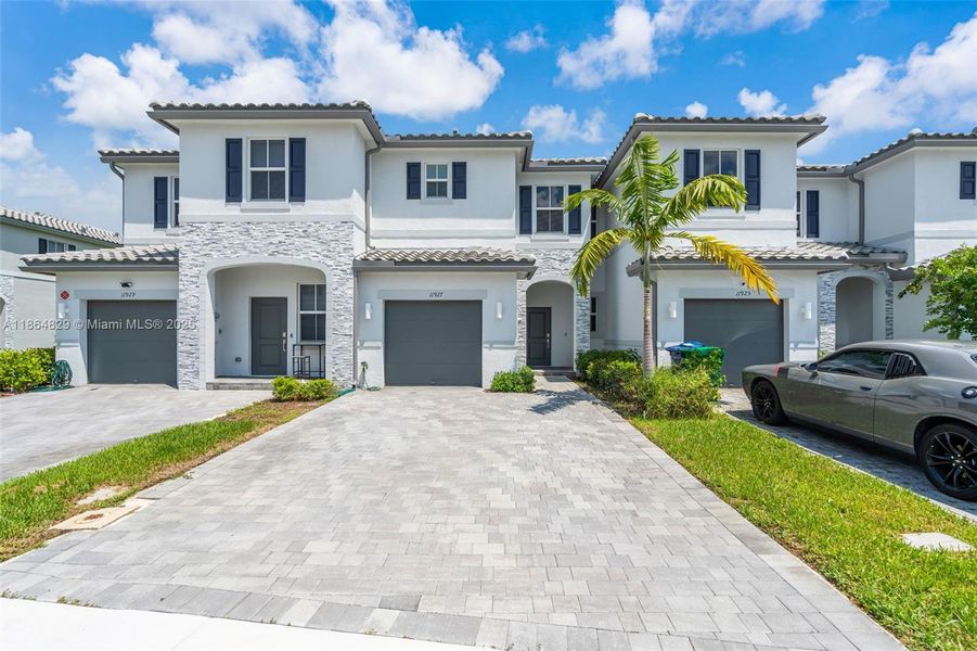 Front exterior of a new home in , Coral Springs, FL, highlighting curb appeal (Image 18).