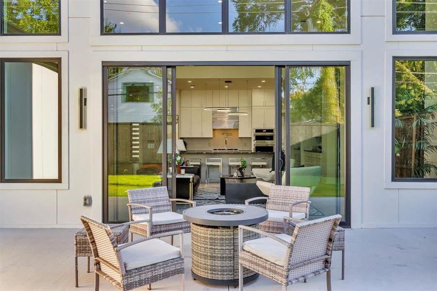 View of patio featuring an outdoor fire pit View of patio featuring an outdoor fire pit