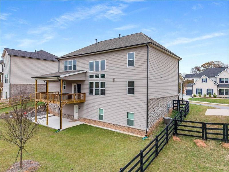 Exterior details and patio area of a home in Carmichael Farms, Canton (Image 27).