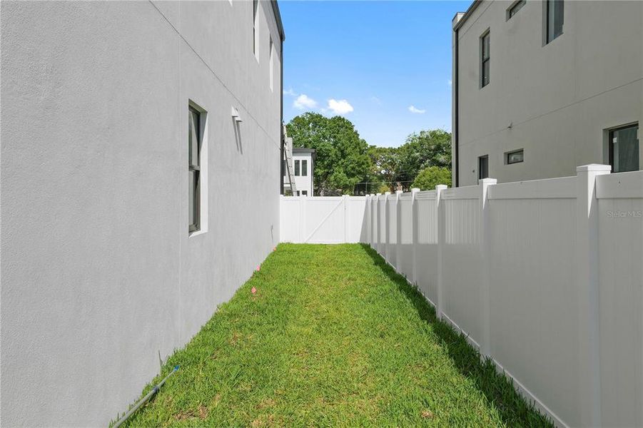 Exterior details and patio area of a home in , Tampa (Image 29).