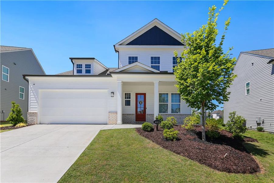 Front exterior of a new home in Edgewater, Canton, GA, highlighting curb appeal (Image 1).