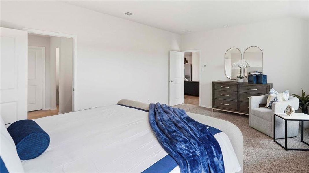 Bedroom with light carpet