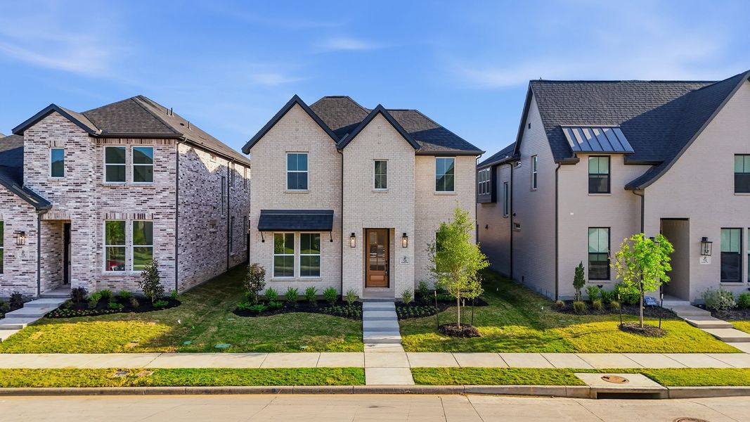 Front exterior of a new home in Light Farms Brenham - 40' Lots, Celina, TX, highlighting curb appeal (Image 22).