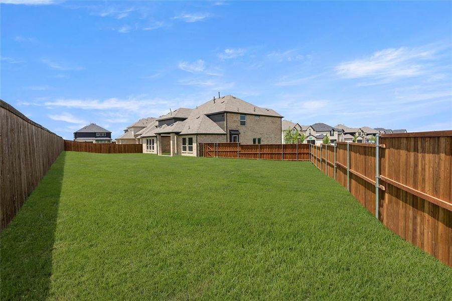 Front exterior of a new home in Villages of Creekwood, Frisco, TX, highlighting curb appeal (Image 18). Front exterior of a new home in Villages of Creekwood, Frisco, TX, highlighting curb appeal (Image 18).