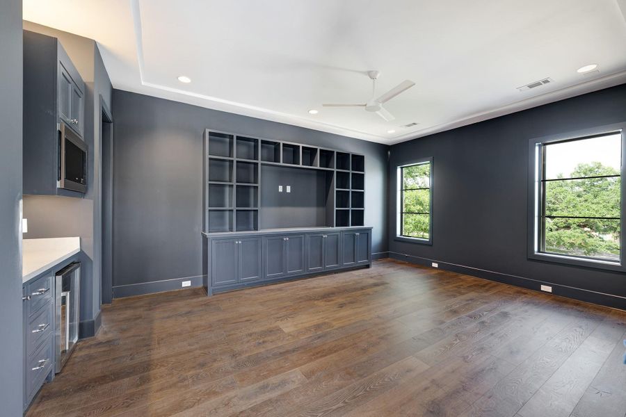 This flexible space on the 2nd floor can be used as a media room or a game room. Wet bar area to the left. This flexible space on the 2nd floor can be used as a media room or a game room. Wet bar area to the left.