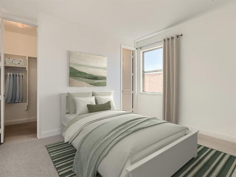 Virtually staged photo - Carpeted bedroom featuring a closet and a spacious closet