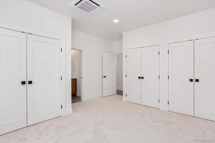 Three large closets in primary bedroom