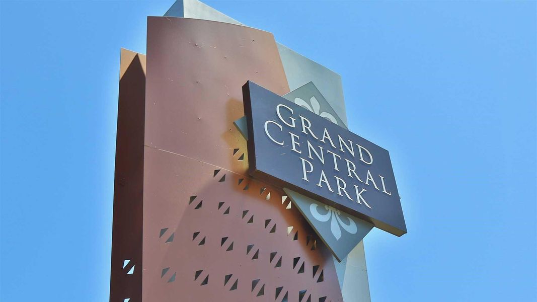 Front exterior of a new home in Grand Central Park 45', Conroe, TX, highlighting curb appeal (Image 12).