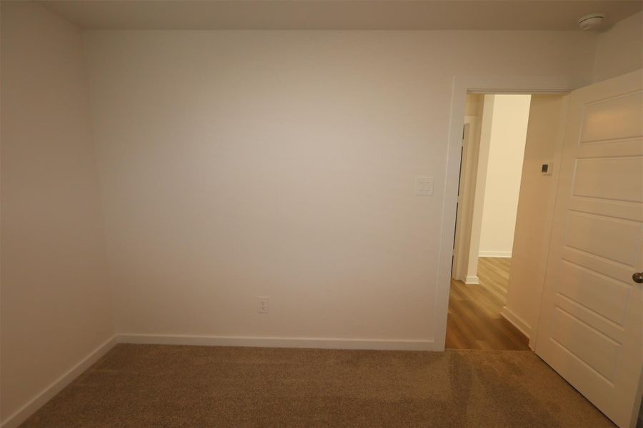 Spacious, unfurnished interior of a new home in Pinewood at Grand Texas, New Caney (Image 15).