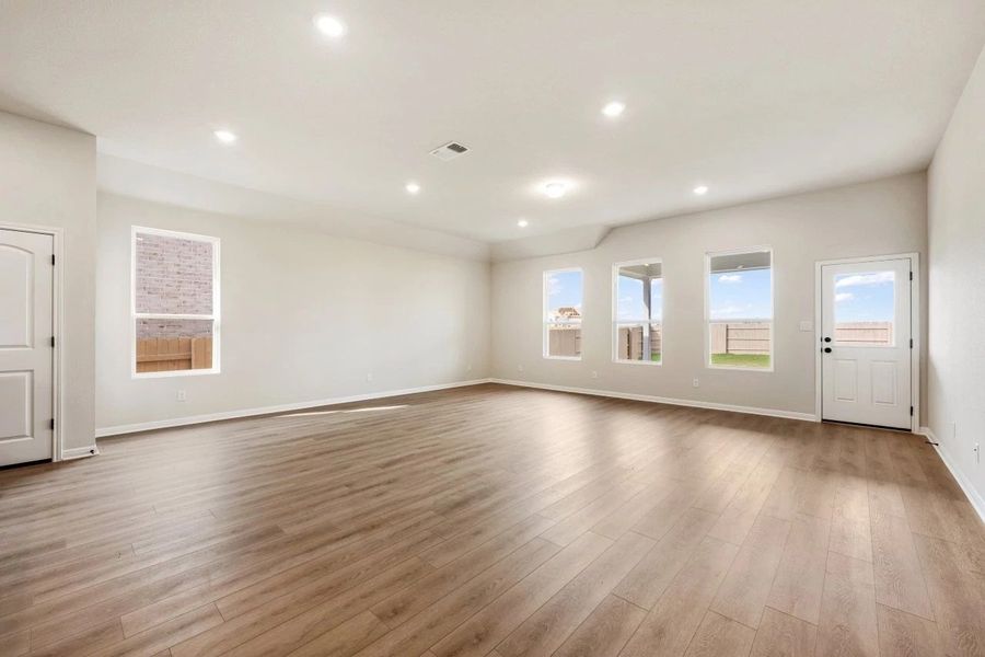 Spacious, unfurnished interior of a new home in The Colony 50s, Bastrop (Image 35).