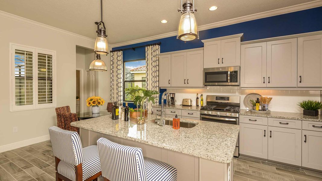 Representative furnished interior of a home built from the Endless Summer 4 by Neal Communities in Boca Royale Golf & Country Club at Wellen Park, Englewood (Image 8).