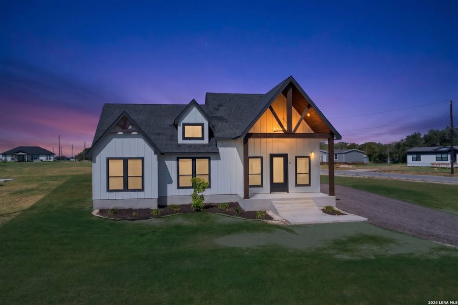 Front exterior of a new home in , Atascosa, TX, highlighting curb appeal (Image 25).