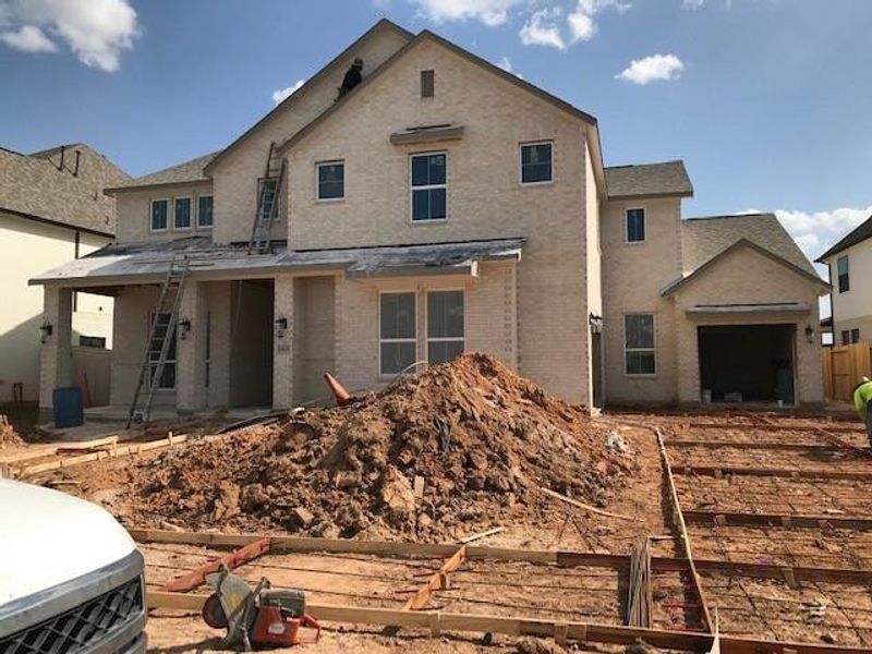 In-progress construction of a new home in , Fulshear, TX (Image 28).