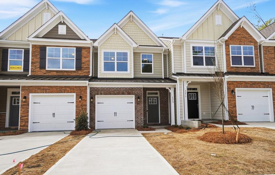 Front exterior of a new home in Harrisburg Village Townhomes, Harrisburg, NC, highlighting curb appeal (Image 2).