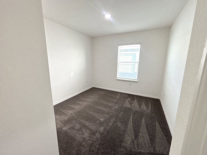 Spacious, unfurnished interior of a new home in Lake Deer Estates, Poinciana (Image 16).