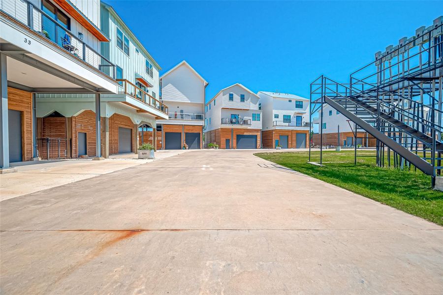 Front exterior of a new home in , Taylor Lake Village, TX, highlighting curb appeal (Image 10).