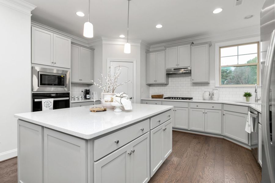 Representative furnished interior of a home built from the Hanover Lux by Keystone Homes NC in Weybridge, Burlington (Image 21).