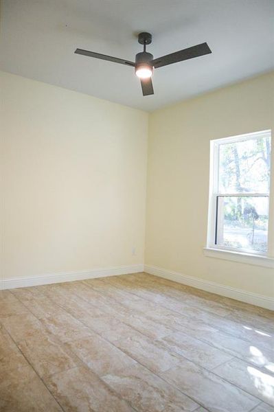 Spare room featuring ceiling fan