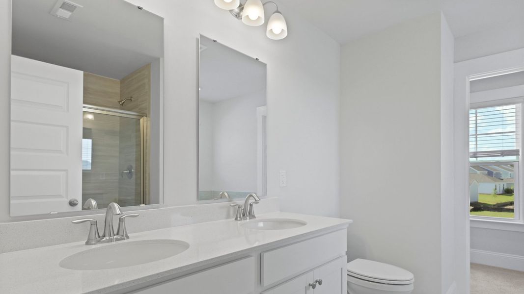 Representative furnished interior of a home built from the HARRIS by D.R. Horton in Sheep Island, Summerville (Image 12).