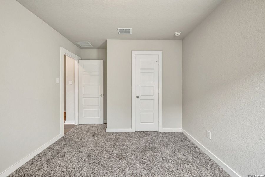 Spacious, unfurnished interior of a new home in Winding Brook, San Antonio (Image 43).