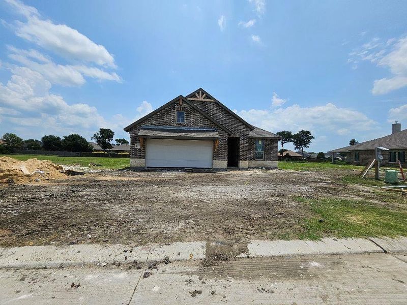 In-progress construction of a new home in The Hollow, Ennis, TX (Image 10).