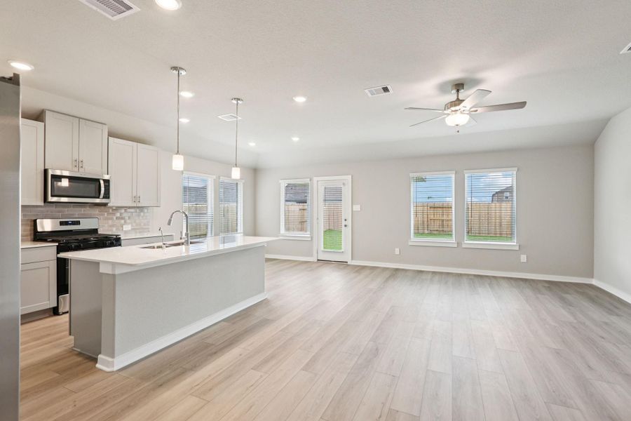 Furnished interior view inside a new home in Massey Oaks - Premier Series, Pearland (Image 10). Furnished interior view inside a new home in Massey Oaks - Premier Series, Pearland (Image 10).