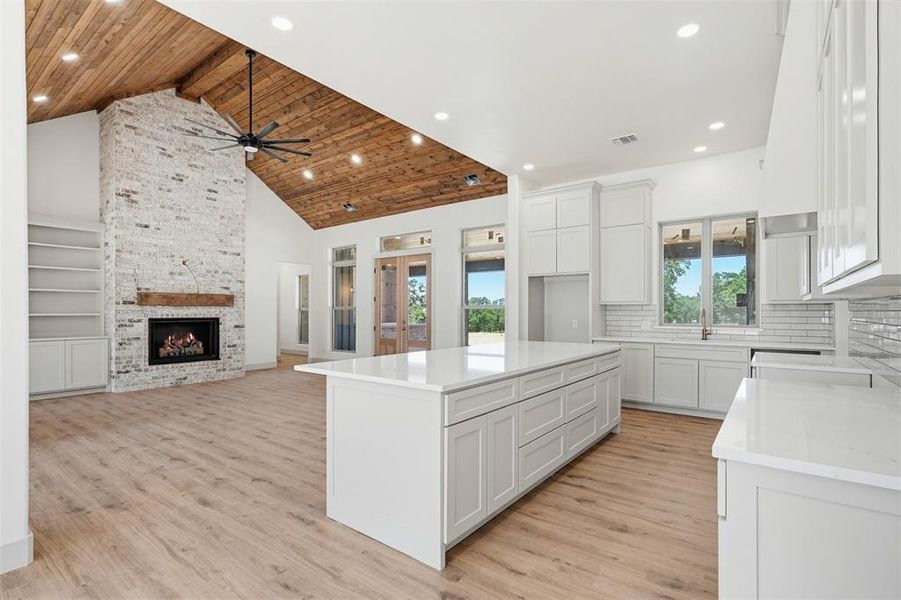 Open concept living area and kitchen Open concept living area and kitchen