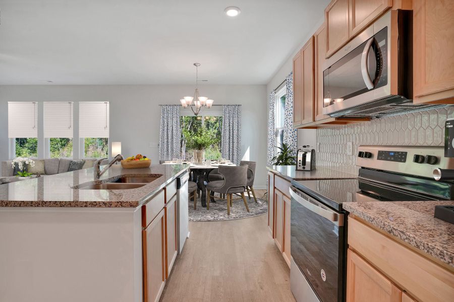 Representative furnished interior of a home built from the Alexander by McKee Homes in Bedford, Raeford (Image 8).