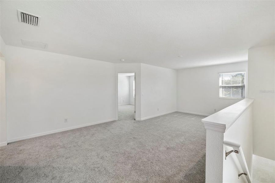 Spacious, unfurnished interior of a new home in Preservation Pointe, Davenport (Image 10).