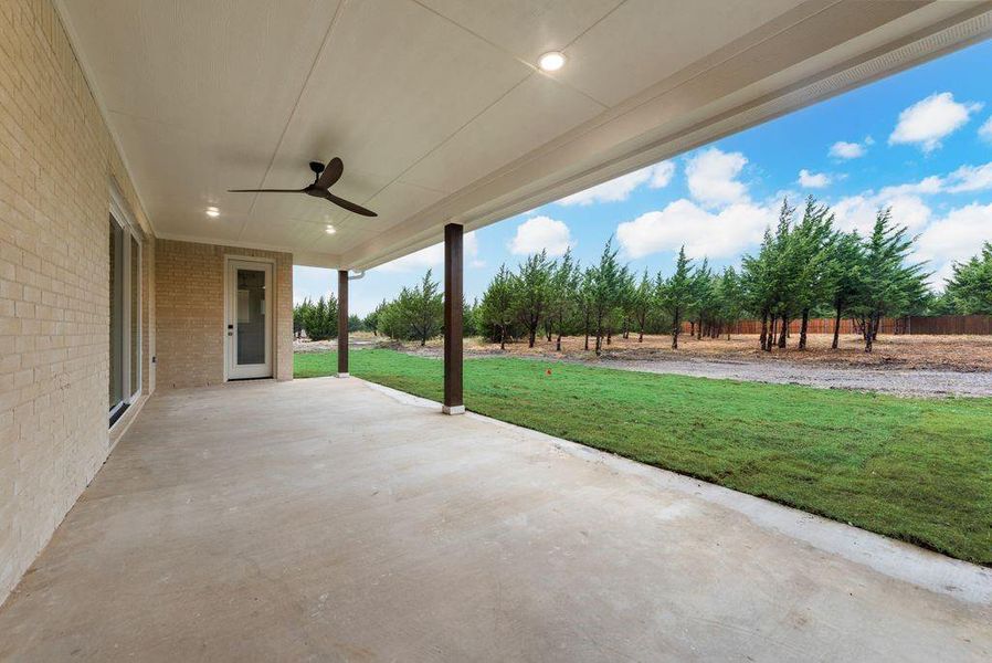 View of patio with ceiling fan