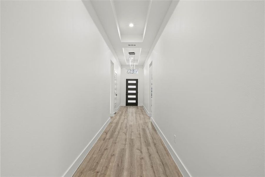 Hall with light wood-type flooring