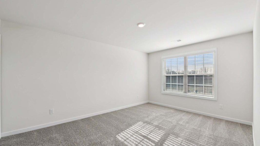 Representative unfurnished interior of a home built from the Adams by D.R. Horton in Oak Grove Hill, Huntersville (Image 22).