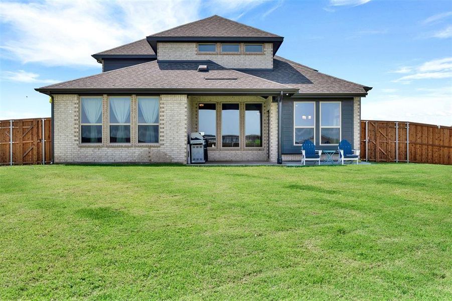 Front exterior of a new home in , Forney, TX, highlighting curb appeal (Image 1). Front exterior of a new home in , Forney, TX, highlighting curb appeal (Image 1).
