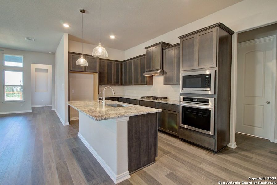 Furnished interior view inside a new home in The Crossvine, Schertz (Image 7).