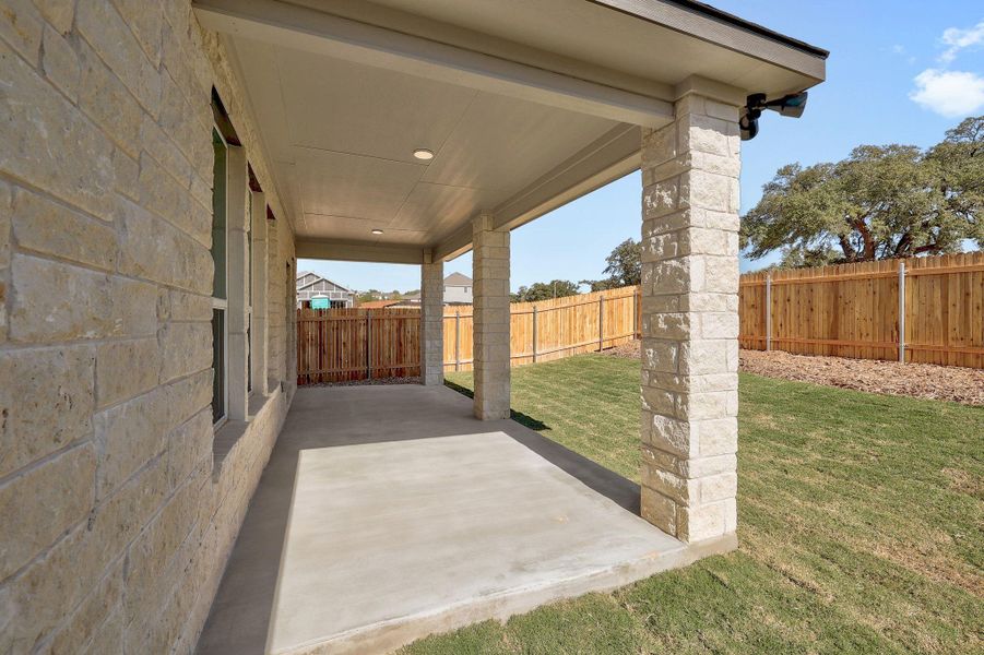 Exterior details and patio area of a home in River Bluff, Leander (Image 20).