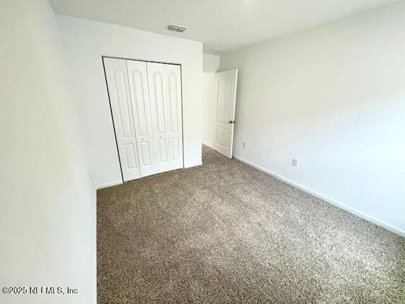 Spacious, unfurnished interior of a new home in Grand Reserve, Bunnell (Image 61).