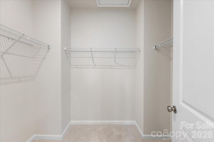 Primary Walk-in Closet Primary Walk-in Closet