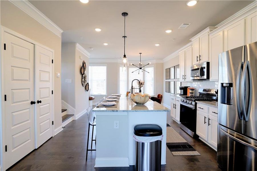 Furnished interior view inside a new home in Towns at Enclave, Lawrenceville (Image 11). Furnished interior view inside a new home in Towns at Enclave, Lawrenceville (Image 11).
