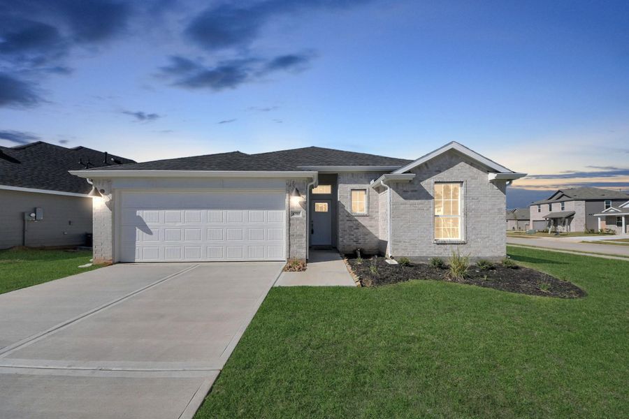 Front exterior of a new home in Grand Oaks Reserve, Cleveland, TX, highlighting curb appeal (Image 2). Front exterior of a new home in Grand Oaks Reserve, Cleveland, TX, highlighting curb appeal (Image 2).