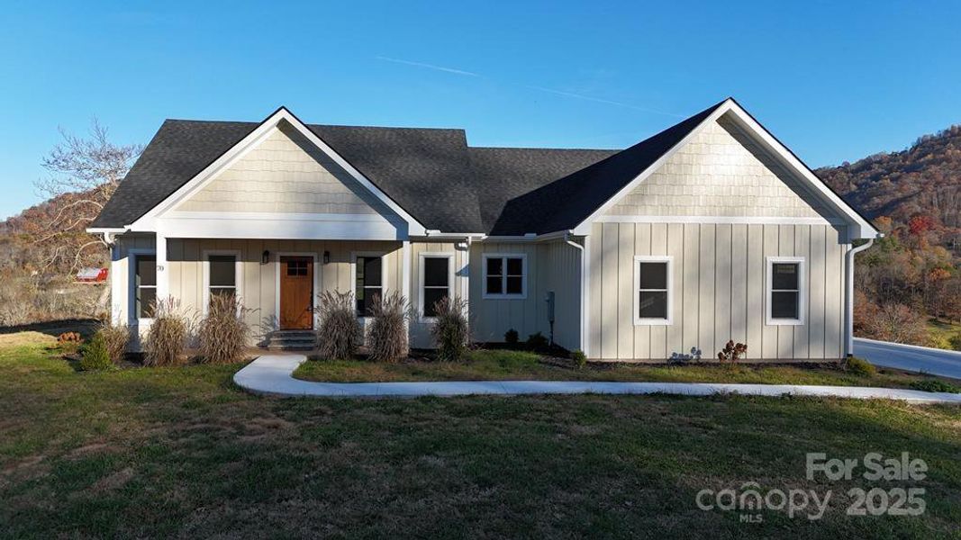 Front exterior of a new home in , Clyde, NC, highlighting curb appeal (Image 2).