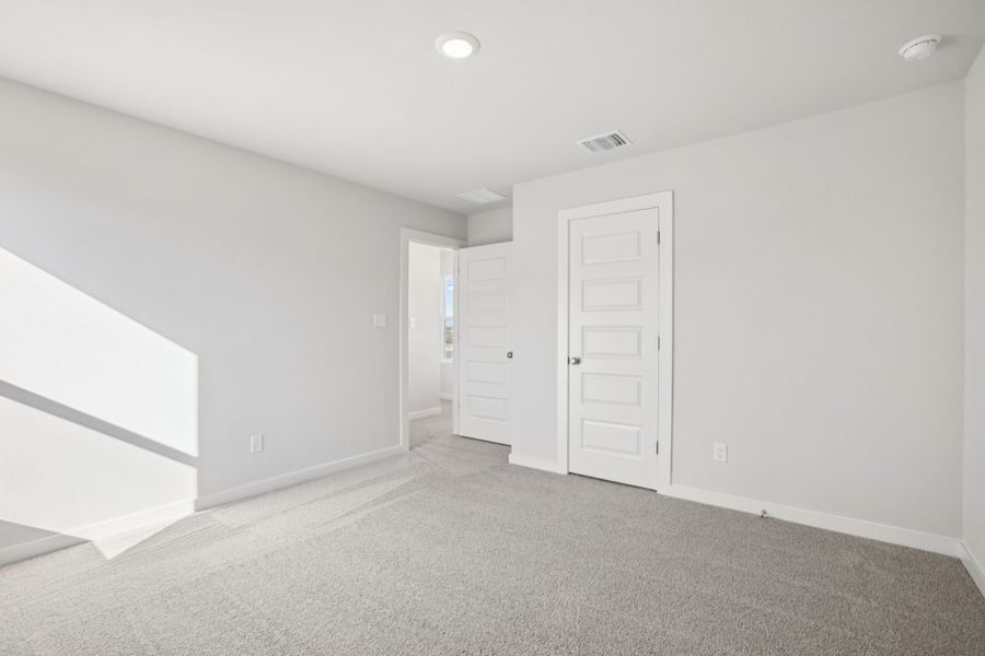 A room with white doors.