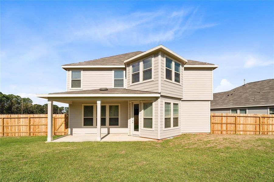 Come and see this spacious backyard with covered rear patio! There is plenty of room for the kids to play and adults to relax! The possibilities are endless!