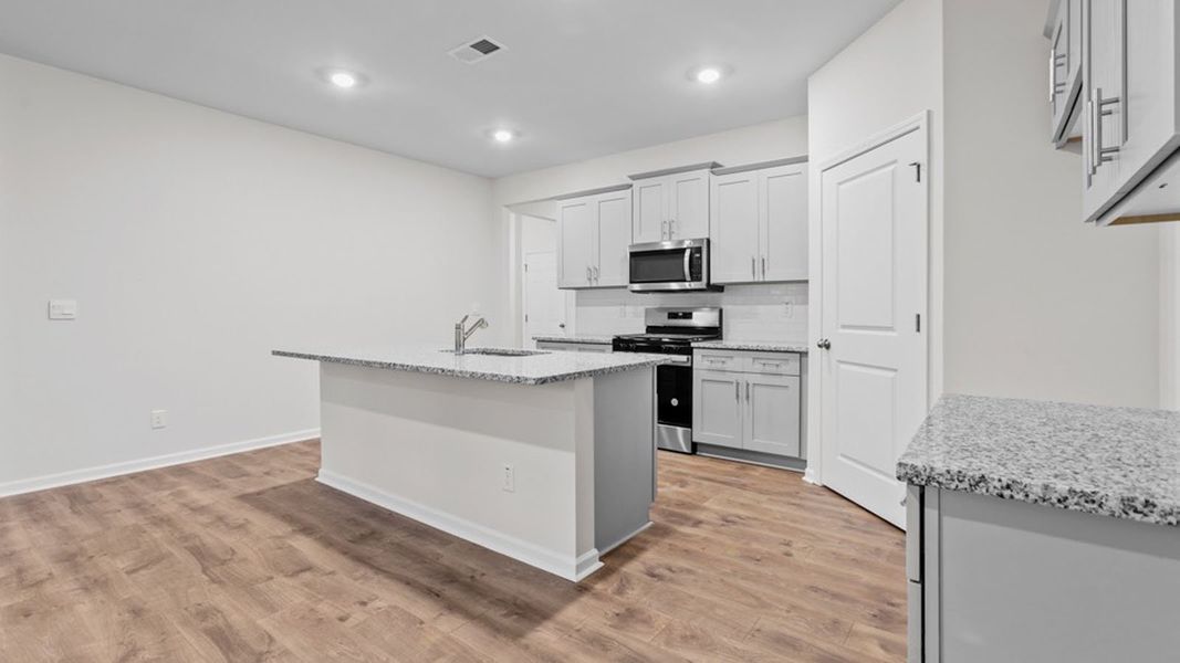 Furnished interior view inside a new home in The Landing at Summerhaven, Mebane (Image 9).